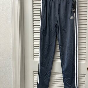 Adidas Kids Dark grey Joggers with White Stripes
Large 14/16